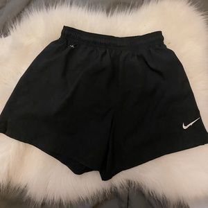 Black Nike Dri-Fit running shorts